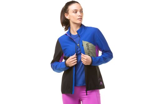 Model wearing the ronhill women's tech Gortex Windstopper Jacket, front view with zip open