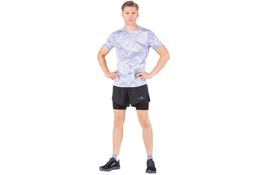 Men's short sleeve t-shirt - Men's golden hour short sleeve t-shirt by Ronhill. This tee has cooling polartec delta fabric to keep you cool, its lightweight, odour resistant, has sweat-wicking as well as being a relaxed fit. This design as a crumpled paper pattern motif. Photo is a front view of the t-shirt being worn by someone..