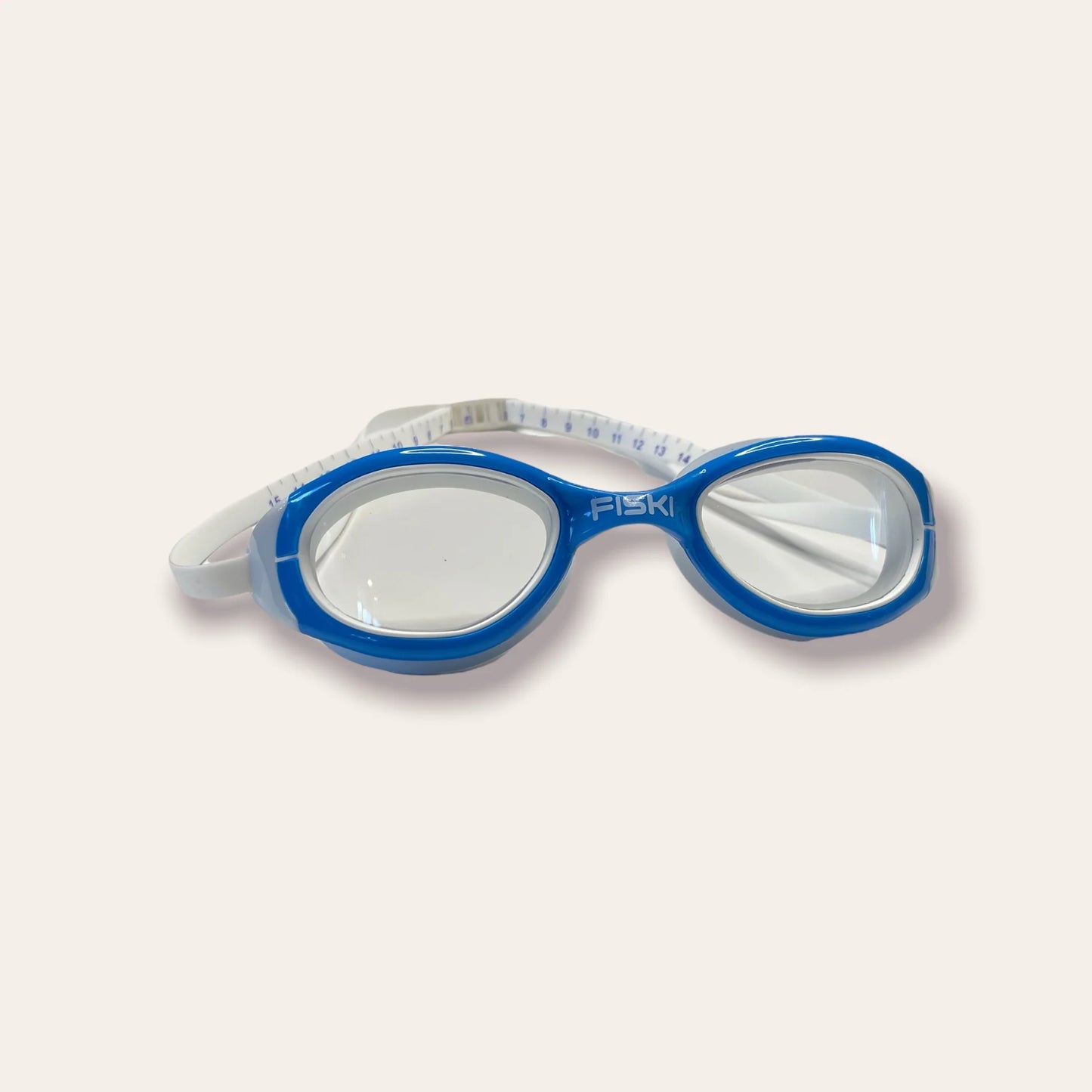 Fiski Hunter clear cobalt swimming goggles. White and blue frames with clear lenses