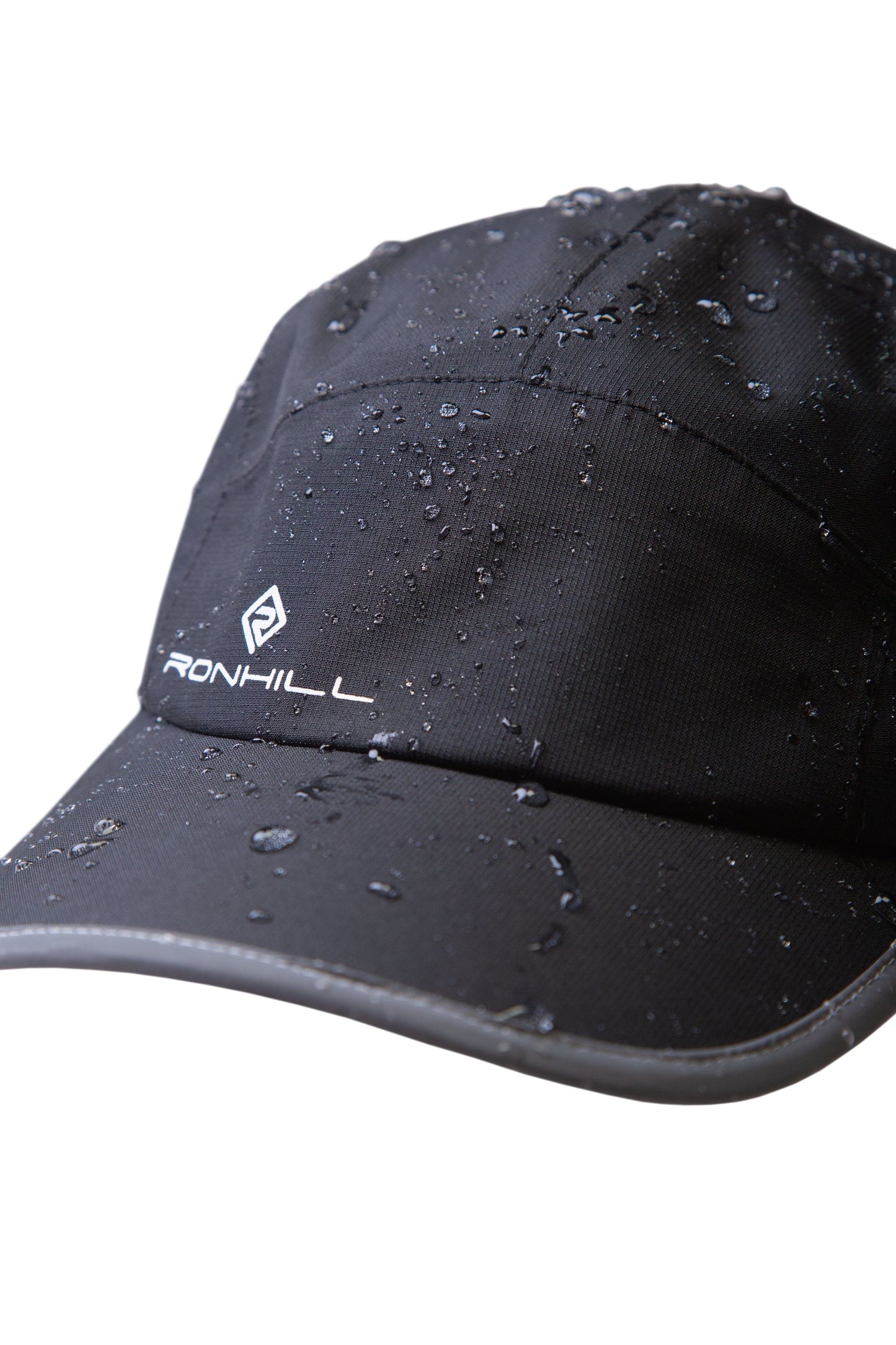 The Ronhill Fortify waterproof running cap providing the sweet spot between breathability and water protection in the wettest of conditions. Colour is Black