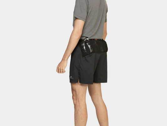 For distance runners, these 5” shorts offer ample storage with 3 mesh stash pockets, and 1 zip pocket—no waist pack needed. Colour is Black.
