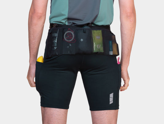 These Ronhill stretch shorts ensure comfort and ample storage, with 2 thigh pockets, 3 mesh stash pockets, and 1 zip pocket—ideal for long runs.