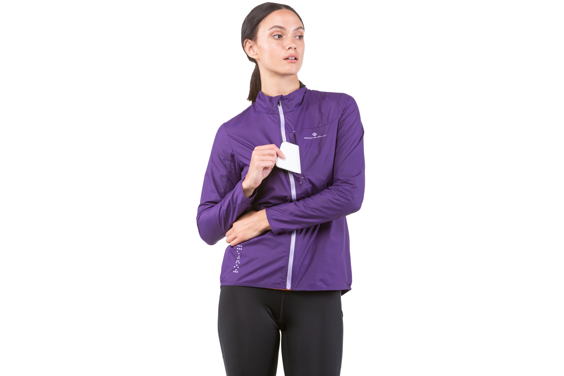 Women's Jacket - Women's Tech LTW Jacket by Ronhill. This jacket is light with a perfect balance of breathability and wind resistance and will keep you protected during days when it's drizzly and gusty. This jacket is in an imperial ultra violet colour. The jacket in this picture is a front view.