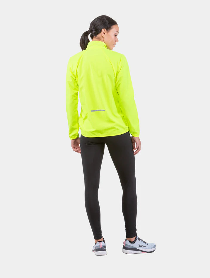 Ronhill's Women's core jacket, fluo yellow, shown on model, back view