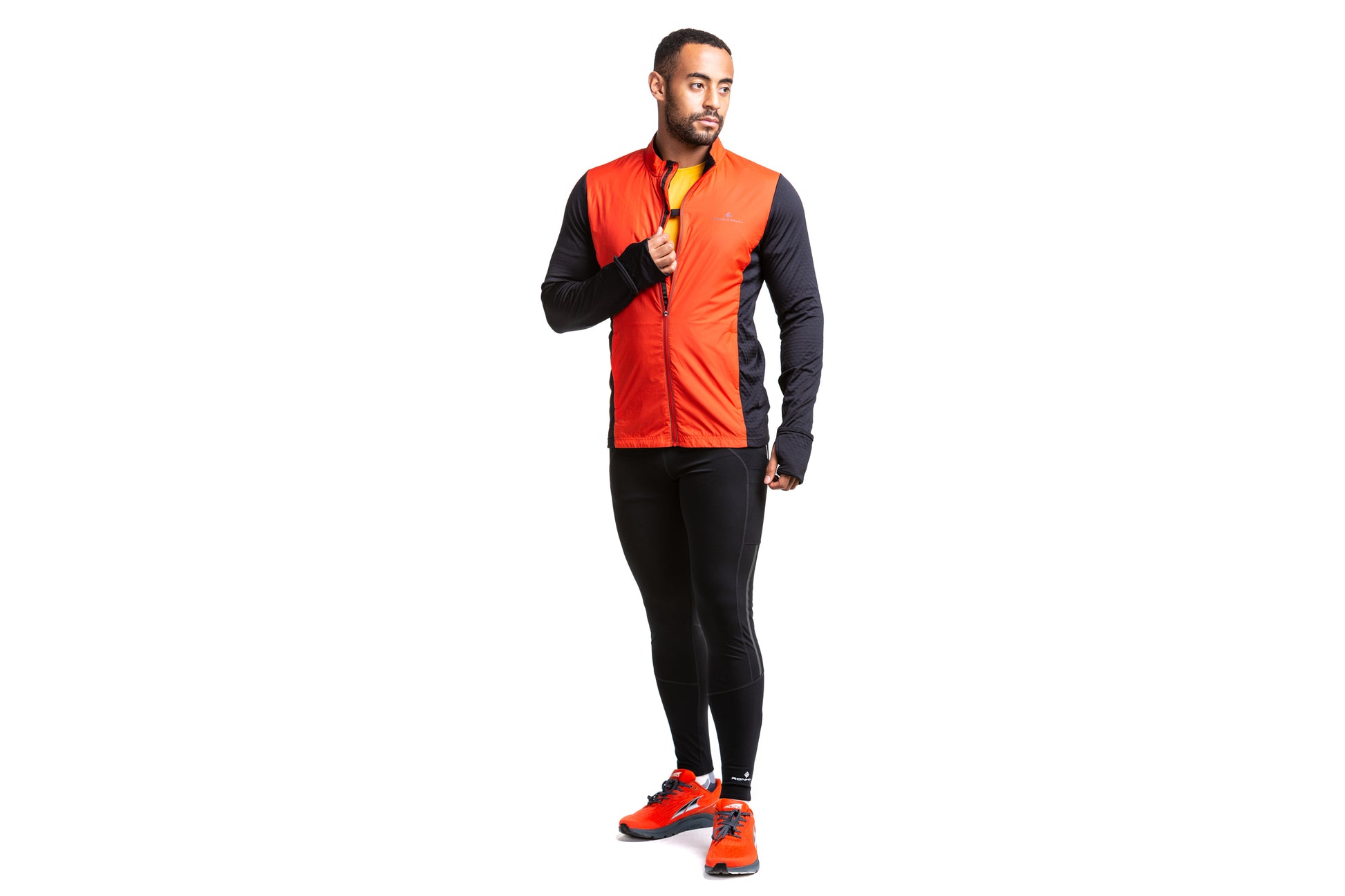 Ronhill's men's tech hyperchill jacket in flame and black shown on model